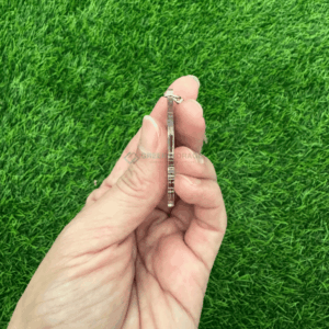 Close up side view of acrylic keychain showing durable 3mm to 4mm thickness